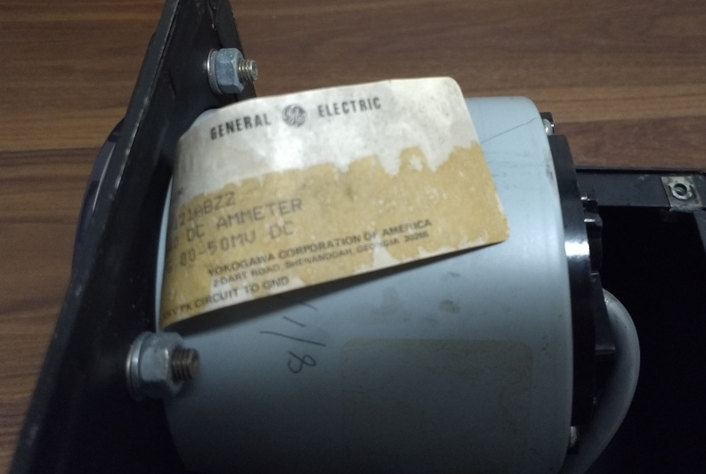A General Electric label on the ammeter casing